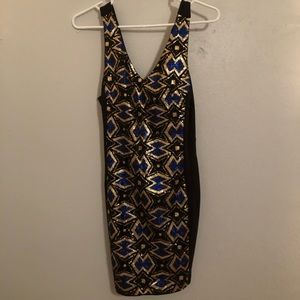 Black dress with gold and blue sparkle pattern